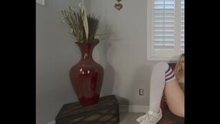 Solo blonde girl Natalia Queen in long stockings spreads her legs on a armchair in VR.